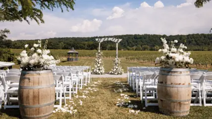 A wedding ceremony in the vineyards at Cave Spring Vineyard in Beamsville.