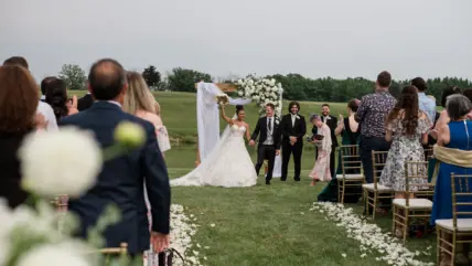 A newly married couple celebrating their union at the altar in Niagara, Canada.