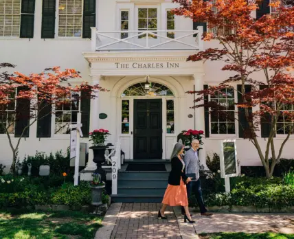 A couple walking out of The Charles Hotel in Niagara-on-the-Lake.