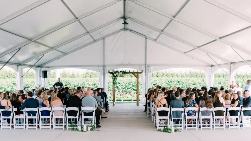 tented wedding ceremony at Bella Terra winery in Niagara on the Lake