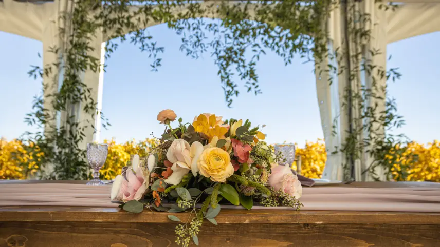 stunning bouquet on a head table at a winery wedding