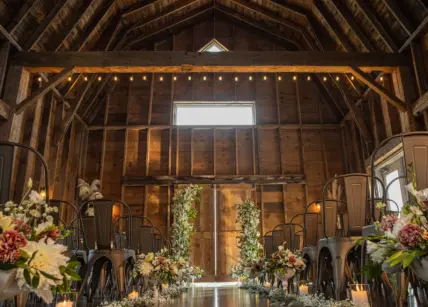 A barn wedding ceremony at Cave Spring Vineyard in Beamsville.