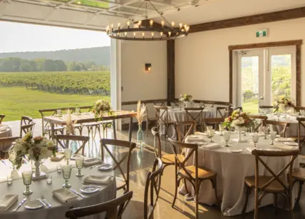 A wedding reception hosted in a barn at Cave Spring Vineyard in Beamsville.