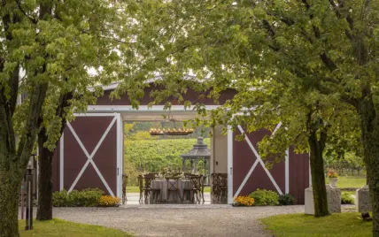 A wedding reception in a barn at Cave Spring Vineyard in Beamsville, Ontario.