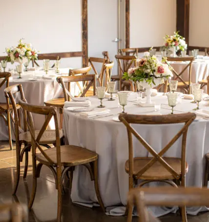 Table settings in the barn at Cave Spring Vineyard in Beamsville.