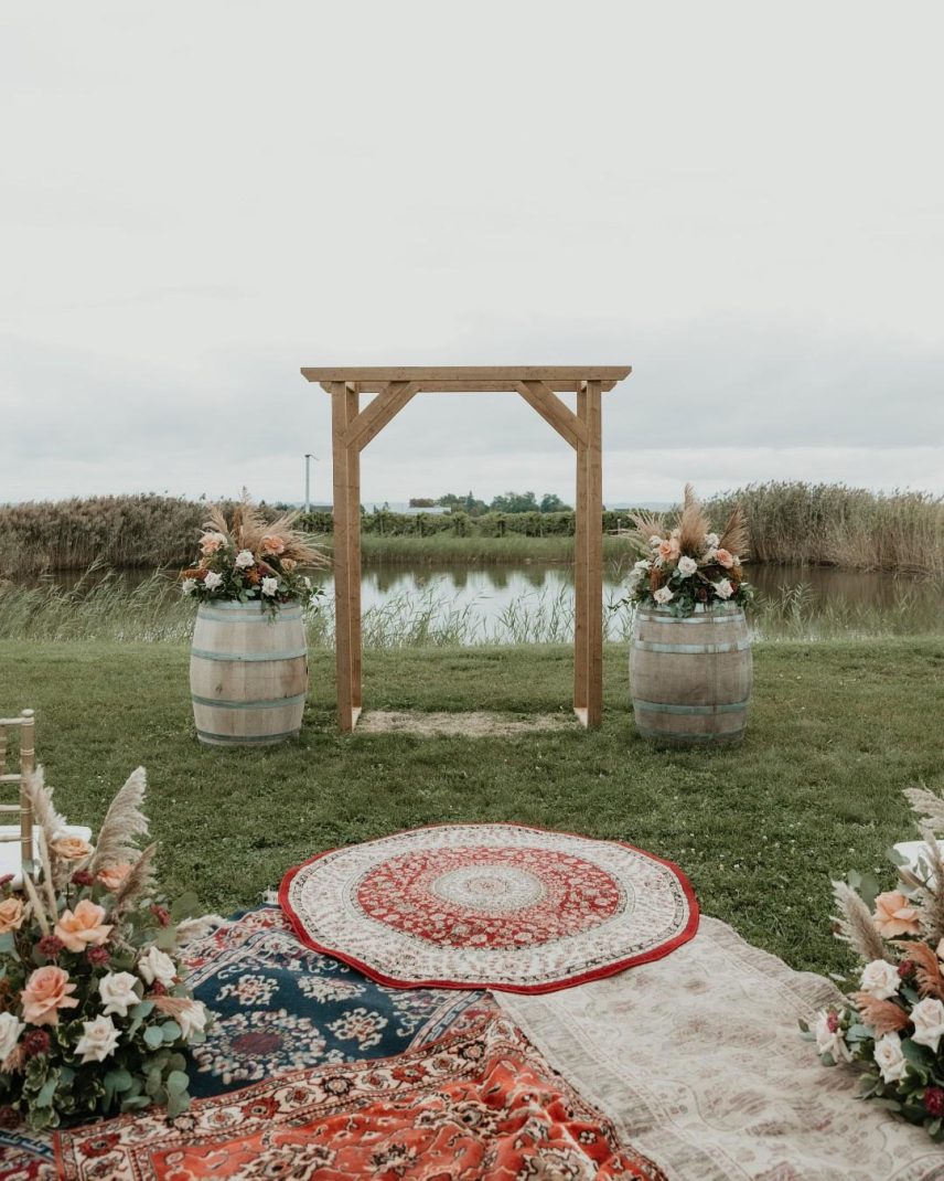 Wooden arch with layered rugs at Bella Terra Vineyards in Niagara-on-the-Lake